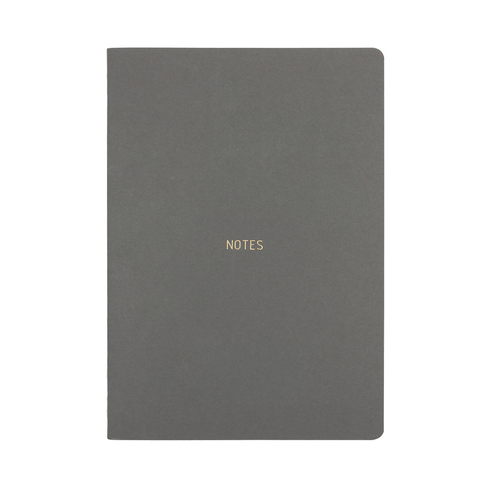 A5 SIZE NOTEBOOK NOTES FOILED COVER DETAIL, CARDBOARD COVER COLOR DARK GREY, INTERIOR DOTTED, ROUNDED CORNERS, VISIBLE SINGER STITCHING ON THE SPINE, INTERIOR PAPER IVORY-COLORED 90 GMS, ACID FREE PAPER MADE IN COLOMBIA BY MAKE2D