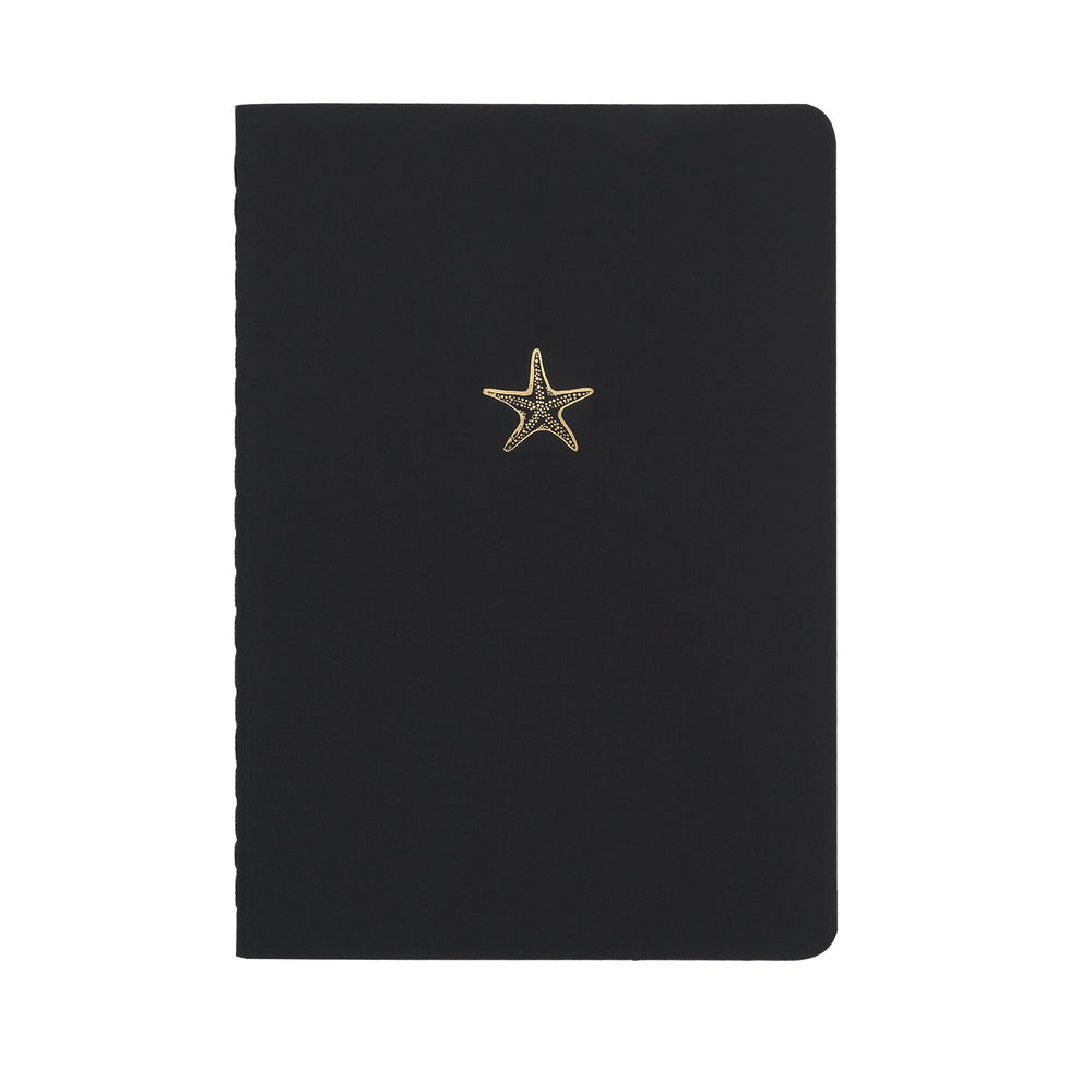 A5 SIZE NOTEBOOK STARFISH NOTES GOLD FOILED COVER DETAIL, CARDBOARD COVER COLOR BLACK, INTERIOR DOTTED, ROUNDED CORNERS, VISIBLE SINGER STITCHING ON THE SPINE, INTERIOR PAPER IVORY-COLORED 90 GMS, ACID FREE PAPER MADE IN COLOMBIA BY MAKE2D