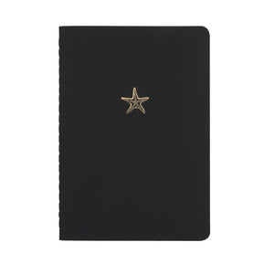 A5 SIZE NOTEBOOK STARFISH NOTES GOLD FOILED COVER DETAIL, CARDBOARD COVER COLOR BLACK, INTERIOR DOTTED, ROUNDED CORNERS, VISIBLE SINGER STITCHING ON THE SPINE, INTERIOR PAPER IVORY-COLORED 90 GMS, ACID FREE PAPER MADE IN COLOMBIA BY MAKE2D