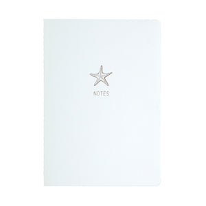 A5 SIZE NOTEBOOK STARFISH NOTES GOLD FOILED COVER DETAIL, CARDBOARD COVER COLOR WHITE, INTERIOR DOTTED, ROUNDED CORNERS, VISIBLE SINGER STITCHING ON THE SPINE, INTERIOR PAPER IVORY-COLORED 90 GMS, ACID FREE PAPER MADE IN COLOMBIA BY MAKE2D
