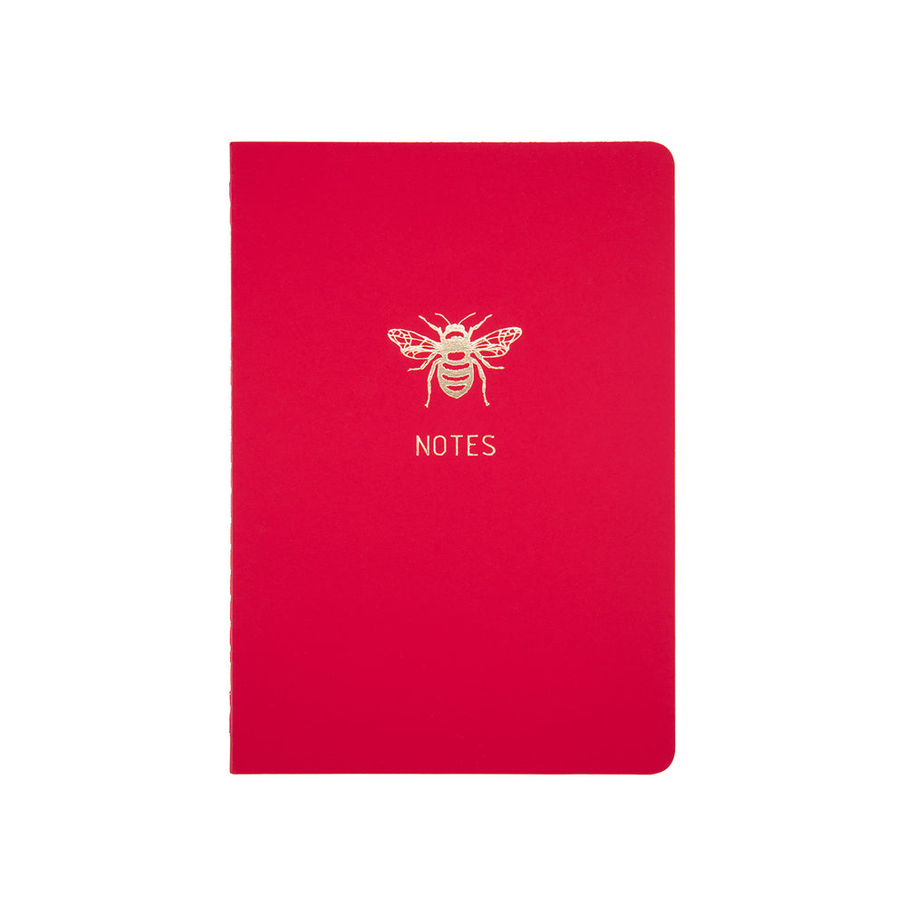 A6 POCKET SIZE NOTEBOOK BEE NOTES GOLD FOILED COVER DETAIL, CARDBOARD COVER COLOR RED, INTERIOR DOTTED OR RULED, ROUNDED CORNERS, VISIBLE SINGER STITCHING ON THE SPINE, INTERIOR PAPER IVORY-COLORED 90 GMS, ACID FREE PAPER MADE IN COLOMBIA BY MAKE2D