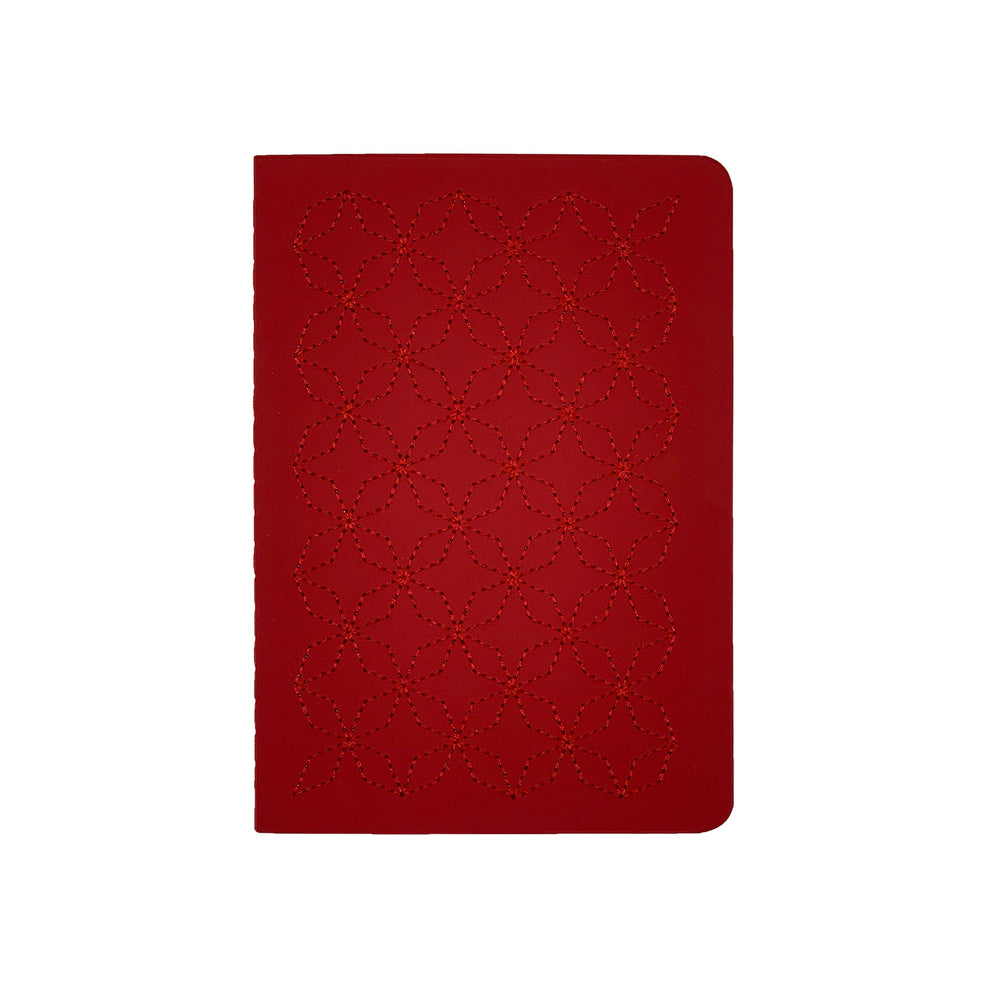A6 POCKET SIZE NOTEBOOK EMBOROIDERED TOKYO COVER DETAIL, CARDBOARD COVER COLOR RED, RED EMBROIDERY, INTERIOR DOTTED OR RULED, ROUNDED CORNERS, VISIBLE SINGER STITCHING ON THE SPINE, INTERIOR PAPER IVORY-COLORED 90 GMS, ACID FREE PAPER BACK GOLD FOIL COVER DETAIL MADE IN COLOMBIA BY MAKE2D