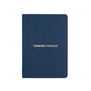 A6 POCKET SIZE NOTEBOOK THINKING PROCESS GOLD FOILED COVER DETAIL, CARDBOARD COVER COLOR BLUE, INTERIOR DOTTED OR RULED, ROUNDED CORNERS, VISIBLE SINGER STITCHING ON THE SPINE, INTERIOR PAPER IVORY-COLORED 90 GMS, ACID FREE PAPER MADE IN COLOMBIA BY MAKE2D
