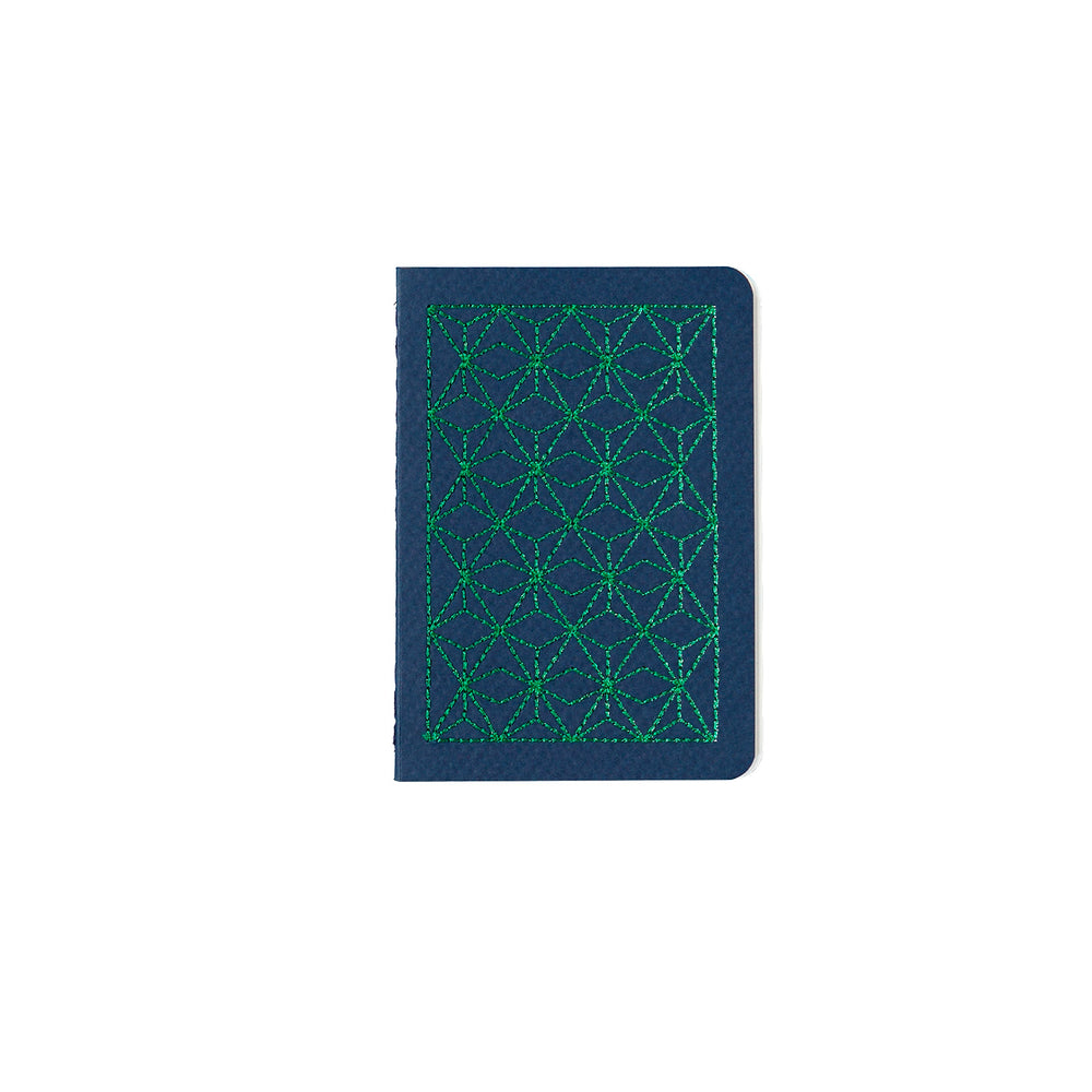 B7 MINI POCKET SIZE NOTEBOOK GREEN EMBROIDERED COVER DETAIL, CARDBOARD COVER COLOR BLUE, INTERIOR DOTTED, ROUNDED CORNERS, VISIBLE SINGER STITCHING ON THE SPINE, INTERIOR PAPER IVORY-COLORED 90 GMS, ACID FREE PAPER BY MAKE2D