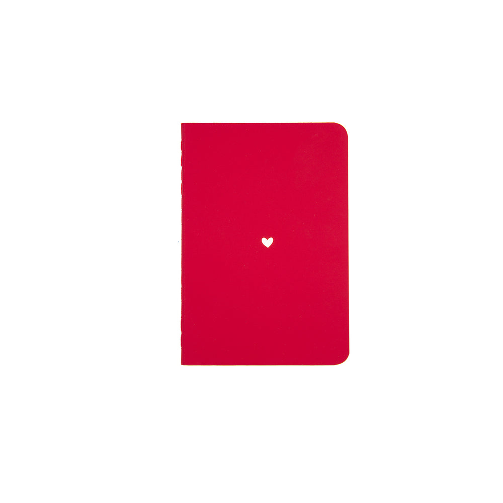 B7 MINI POCKET SIZE NOTEBOOK HEART GOLD FOILED COVER DETAIL, CARDBOARD COVER COLOR RED, INTERIOR DOTTED, ROUNDED CORNERS, VISIBLE SINGER STITCHING ON THE SPINE, INTERIOR PAPER IVORY-COLORED 90 GMS, ACID FREE PAPER MADE IN COLOMBIA BY MAKE2D