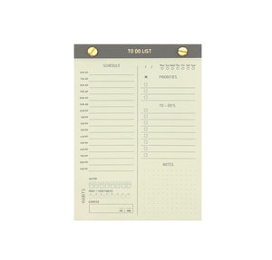 TO-DO LIST NOTEPAD GOLD FOILED COVER DETAIL, CARDBOARD COVER COLOR GREY, HABITS SCHEDULE TO-DO’S PRIORITIES NOTES INTERIOR PAPER IVORY-COLORED 90 GMS, ACID FREE PAPER, GOLD SCREWS WITH PRE-PERFORATED DETACHABLE SHEETS MADE IN COLOMBIA BY MAKE2D
