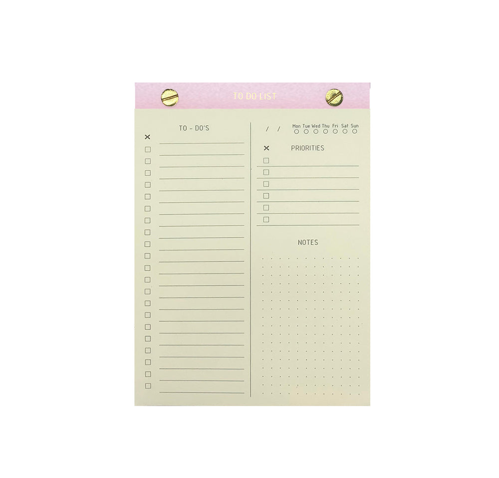 TO-DO LIST NOTEPAD GOLD FOILED COVER DETAIL, CARDBOARD COVER COLOR LIGHT PINK, TO-DO’S PRIORITIES NOTES INTERIOR PAPER IVORY-COLORED 90 GMS, ACID FREE PAPER, GOLD SCREWS WITH PRE-PERFORATED DETACHABLE SHEETS MADE IN COLOMBIA BY MAKE2D