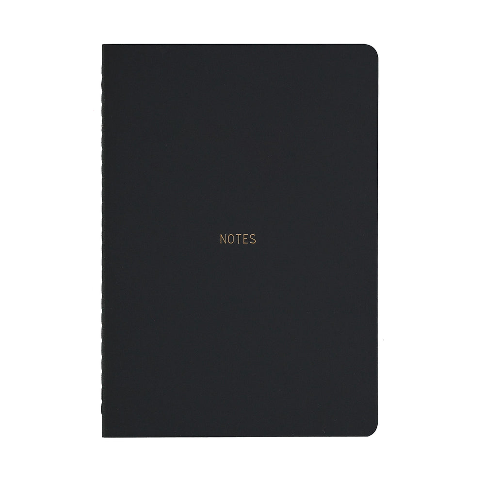 A5 SIZE NOTEBOOK NOTES GOLD FOILED COVER DETAIL, CARDBOARD COVER COLOR BLACK INTERIOR DOTTED OR RULED, ROUNDED CORNERS, VISIBLE SINGER STITCHING ON THE SPINE, INTERIOR PAPER IVORY-COLORED 90 GMS, ACID FREE PAPER MADE IN COLOMBIA BY MAKE2D