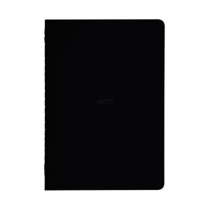 
                
                    Load image into Gallery viewer, A5 SIZE NOTEBOOK  NOTES MATE FOILED COVER DETAIL, CARDBOARD COVER COLOR BLACK, INTERIOR DOTTED, ROUNDED CORNERS, VISIBLE SINGER STITCHING ON THE SPINE, INTERIOR PAPER IVORY-COLORED 90 GMS, ACID FREE PAPER MADE IN COLOMBIA BY MAKE2D
                
            