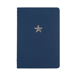
                
                    Load image into Gallery viewer, A5 SIZE NOTEBOOK STARFISH NOTES GOLD FOILED COVER DETAIL, CARDBOARD COVER COLOR BLUE, INTERIOR DOTTED, ROUNDED CORNERS, VISIBLE SINGER STITCHING ON THE SPINE, INTERIOR PAPER IVORY-COLORED 90 GMS, ACID FREE PAPER MADE IN COLOMBIA BY MAKE2D
                
            