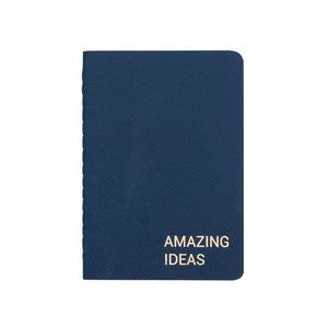 A6 POCKET SIZE NOTEBOOK AMAZING IDEAS GOLD FOILED COVER DETAIL, CARDBOARD COVER COLOR BLUE, INTERIOR DOTTED OR RULED, ROUNDED CORNERS, VISIBLE SINGER STITCHING ON THE SPINE, INTERIOR PAPER IVORY-COLORED 90 GMS, ACID FREE PAPER MADE IN COLOMBIA BY MAKE2D