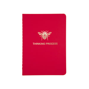 A6 POCKET SIZE NOTEBOOK BEE THINKING PROCESS GOLD FOILED COVER DETAIL, CARDBOARD COVER COLOR RED, INTERIOR DOTTED OR RULED, ROUNDED CORNERS, VISIBLE SINGER STITCHING ON THE SPINE, INTERIOR PAPER IVORY-COLORED 90 GMS, ACID FREE PAPER MADE IN COLOMBIA BY MAKE2D