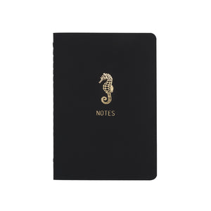 A6 POCKET SIZE NOTEBOOK SEAHORSE NOTES GOLD FOILED COVER DETAIL, CARDBOARD COVER COLOR BLACK, INTERIOR DOTTED OR RULED, ROUNDED CORNERS, VISIBLE SINGER STITCHING ON THE SPINE, INTERIOR PAPER IVORY-COLORED 90 GMS, ACID FREE PAPER MADE IN COLOMBIA BY MAKE2D