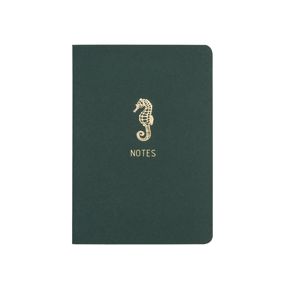 A6 POCKET SIZE NOTEBOOK SEAHORSE NOTES GOLD FOILED COVER DETAIL, CARDBOARD COVER COLOR GREEN, INTERIOR DOTTED OR RULED, ROUNDED CORNERS, VISIBLE SINGER STITCHING ON THE SPINE, INTERIOR PAPER IVORY-COLORED 90 GMS, ACID FREE PAPER MADE IN COLOMBIA BY MAKE2D
