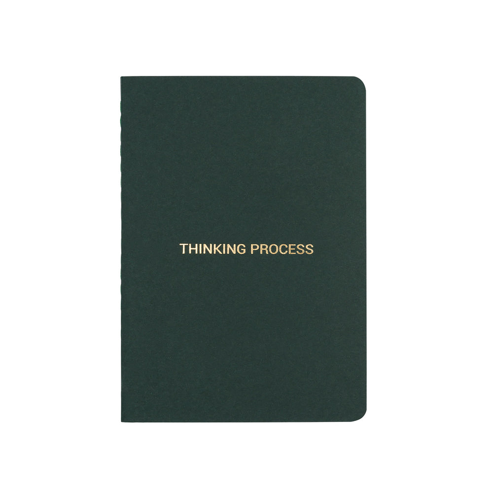 A6 POCKET SIZE NOTEBOOK THINKING PROCESS GOLD FOILED COVER DETAIL, CARDBOARD COVER COLOR GREY, INTERIOR DOTTED OR RULED, ROUNDED CORNERS, VISIBLE SINGER STITCHING ON THE SPINE, INTERIOR PAPER IVORY-COLORED 90 GMS, ACID FREE PAPER MADE IN COLOMBIA BY MAKE2D