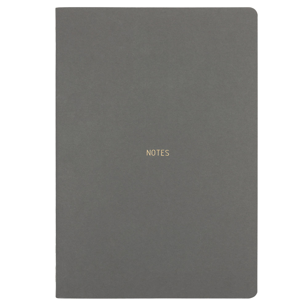 B5 SIZE NOTEBOOK NOTES GOLD FOILED COVER DETAIL, CARDBOARD COVER COLOR DARK GREY INTERIOR DOTTED OR RULED, ROUNDED CORNERS, VISIBLE SINGER STITCHING ON THE SPINE, INTERIOR PAPER IVORY-COLORED 90 GMS, ACID FREE PAPER MADE IN COLOMBIA BY MAKE2D