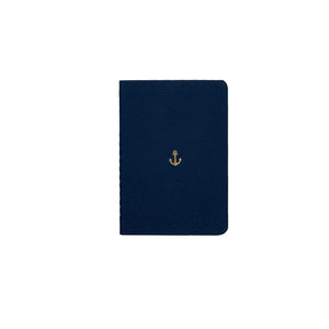 B7 MINI POCKET SIZE NOTEBOOK ANCHOR GOLD FOILED COVER DETAIL, CARDBOARD COVER COLOR BLUE, INTERIOR DOTTED, ROUNDED CORNERS, VISIBLE SINGER STITCHING ON THE SPINE, INTERIOR PAPER IVORY-COLORED 90 GMS, ACID FREE PAPER MADE IN COLOMBIA BY MAKE2D
