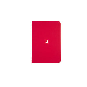 B7 MINI POCKET SIZE NOTEBOOK MOON GOLD FOILED COVER DETAIL, CARDBOARD COVER COLOR RED, INTERIOR DOTTED, ROUNDED CORNERS, VISIBLE SINGER STITCHING ON THE SPINE, INTERIOR PAPER IVORY-COLORED 90 GMS, ACID FREE PAPER MADE IN COLOMBIA BY MAKE2D