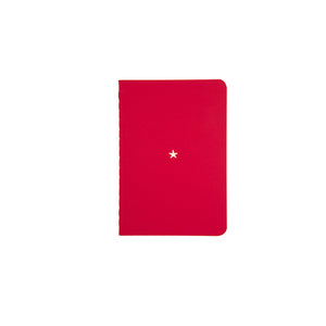 B7 MINI POCKET SIZE NOTEBOOK STAR GOLD FOILED COVER DETAIL, CARDBOARD COVER COLOR RED, INTERIOR DOTTED, ROUNDED CORNERS, VISIBLE SINGER STITCHING ON THE SPINE, INTERIOR PAPER IVORY-COLORED 90 GMS, ACID FREE PAPER MADE IN COLOMBIA BY MAKE2D