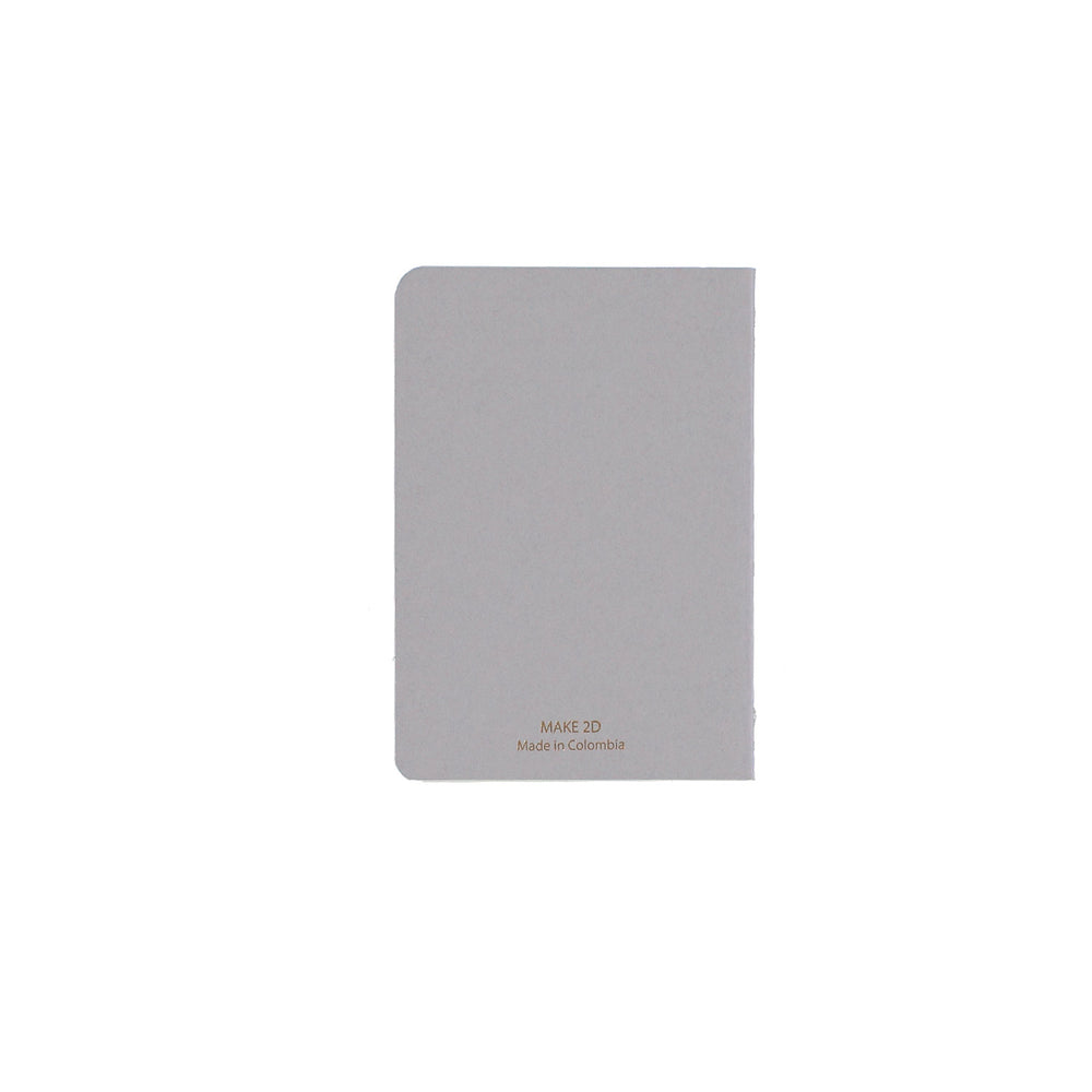 B7 MINI POCKET SIZE NOTEBOOK BACK GOLD FOILED COVER DETAIL, CARDBOARD COVER COLOR SMOKE GREY, INTERIOR DOTTED, ROUNDED CORNERS, VISIBLE SINGER STITCHING ON THE SPINE, INTERIOR PAPER IVORY-COLORED 90 GMS, ACID FREE PAPER MADE IN COLOMBIA BY MAKE2D